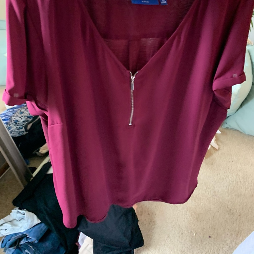 Flowy zip top can dress up or down! Sexy top!